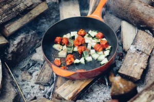 cast iron pan on campfire